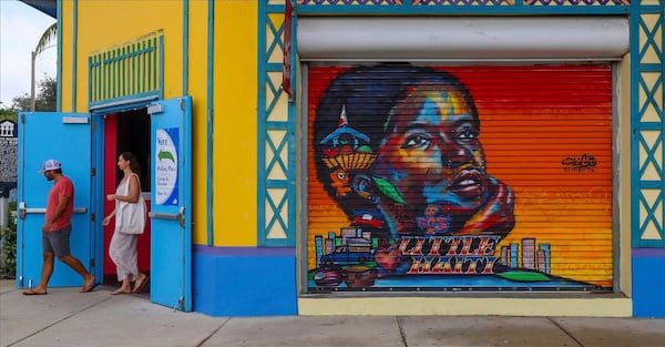 A voter exits the polling station on Election Day at the Little Haiti Cultural Complex's Caribbean Marketplace in Miami's Little Haiti neighborhood Tuesday, Nov. 5, 2024. (Carl Juste//Miami Herald via AP)