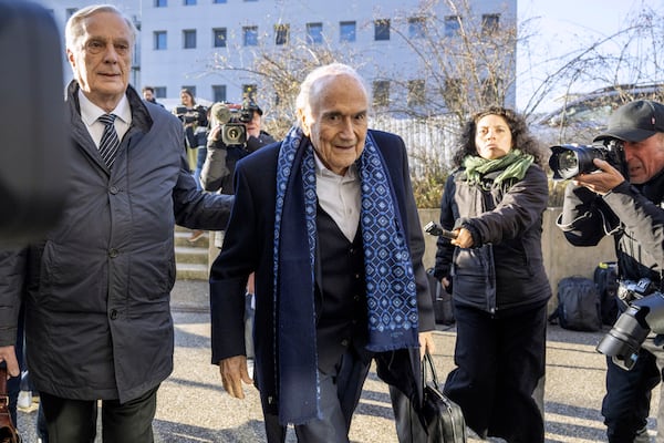 Ex-FIFA president Sepp Blatter, center, arrives in front of the special appeals court in Muttenz, Switzerland, for his retrial on fraud, forgery and misappropriation charges Monday, March 3, 2025. (Urs Flueeler/Keystone via AP)10