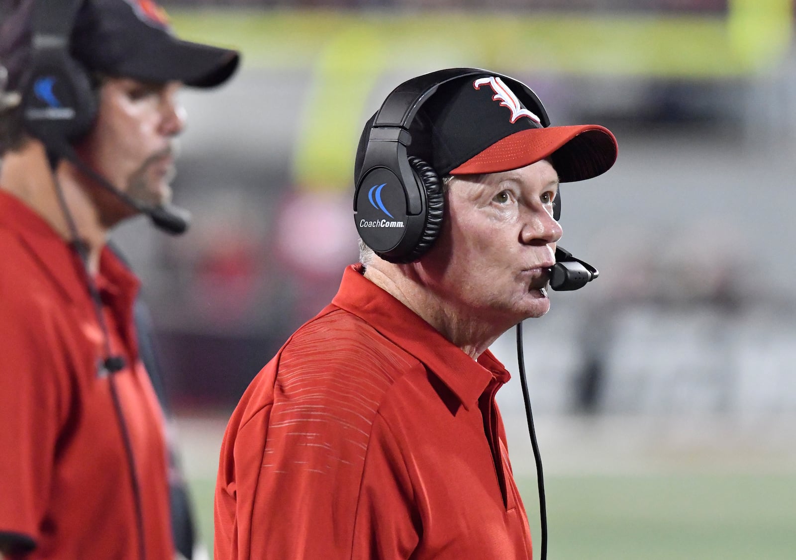 Louisville head coach Bobby Petrino watches a replay on the video board during the second half of an NCAA college football game against Georgia Tech, Friday, Oct. 5, 2018, in Louisville, Ky. Georgia Tech won 66-31. (AP Photo/Timothy D. Easley)