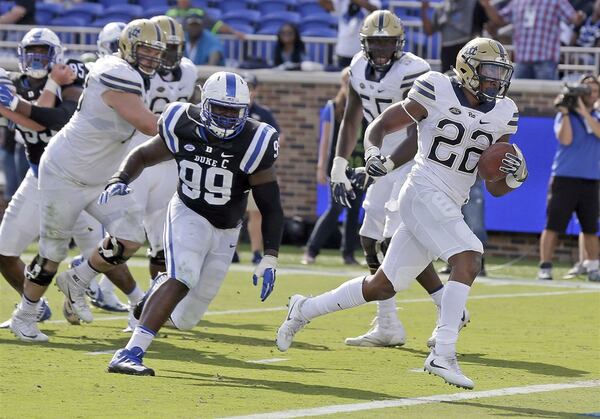 Duke's Mike Ramsay chases Pittsburgh's Darrin Hall in a game in Durham, N.C. on Oct. 27, 2017.  (Gary Broome/Associated Press)