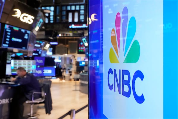 The logo for CNBC appears on the CNBC studio on the floor of the New York Stock Exchange, Wednesday, Nov. 20, 2024. (AP Photo/Richard Drew)