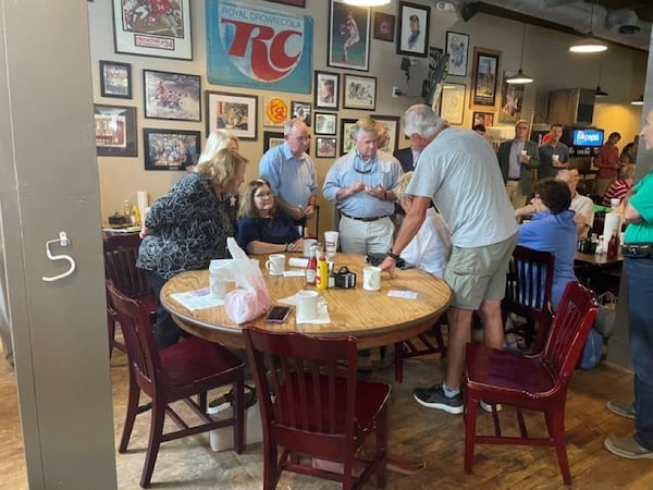 U.S. Rep. Drew Ferguson speaks Monday with constituents in Newnan. He leveled blame at the Biden administration for the crisis in Afghanistan. “They relied on intelligence that was faulty,” the congressman said.