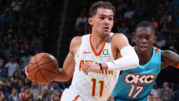 Hawks guard Trae Young handles the ball against Dennis Schroder of the Oklahoma City Thunder Nov, 30, 2018, at Chesapeake Energy Arena in Oklahoma City, Okla.