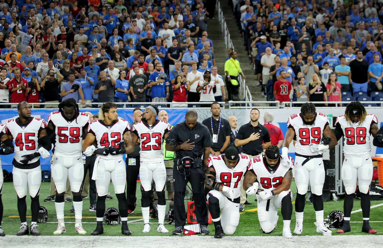 Photos: Falcons show solidarity during National Anthem