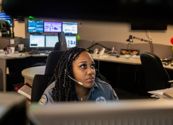 Dispatch operator Kelah Handley answers calls at a Sandy Springs 911 call center on Wednesday, April 17, 2019. STEVE SCHAEFER / SPECIAL TO THE AJC