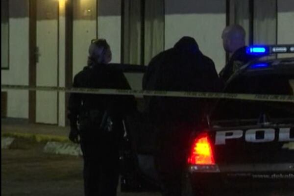 Investigators were on the scene of a shooting at a motel on Millwood Lane. (Photo: Channel 2 Action News)