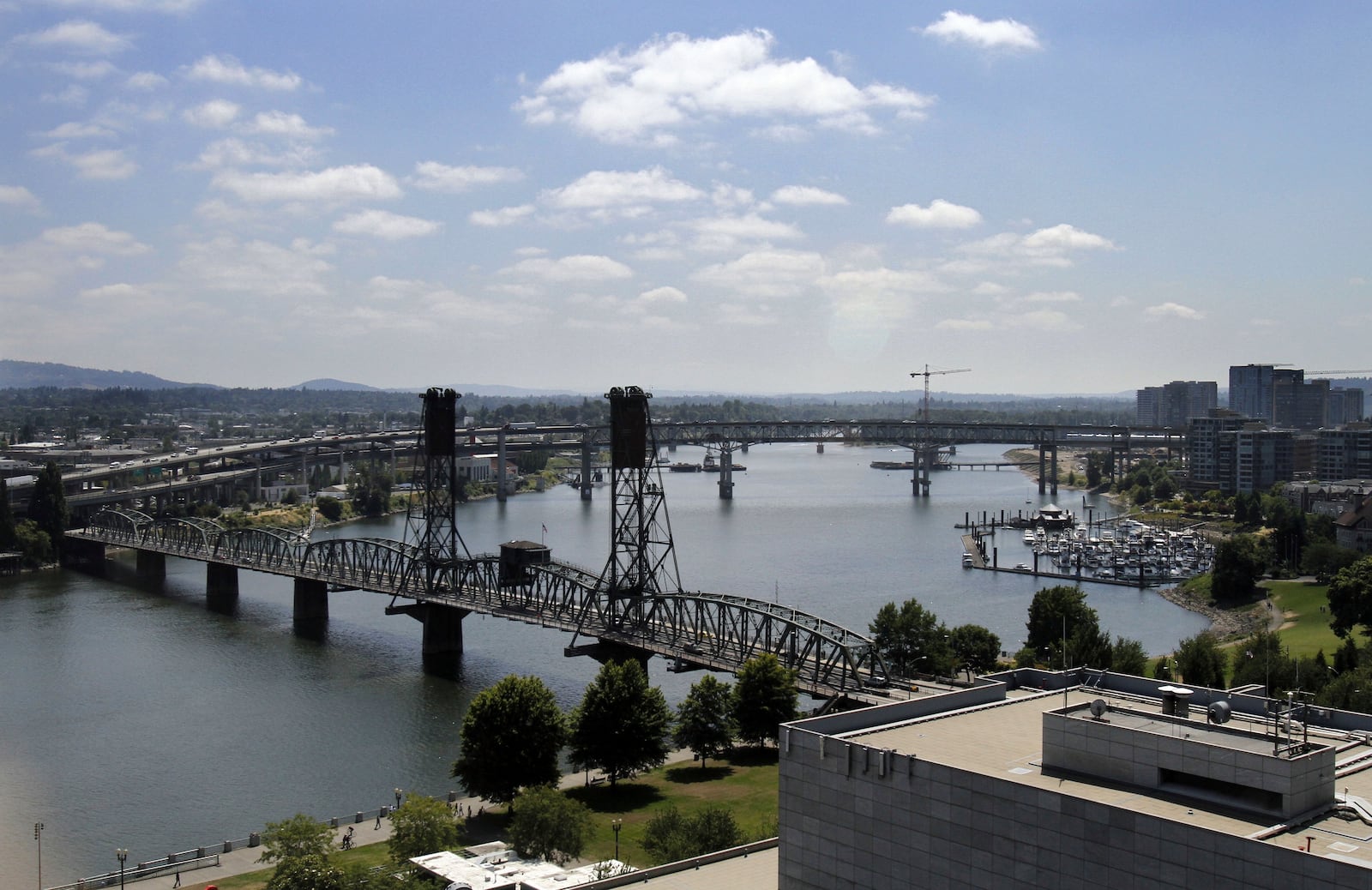 FILE - Several bridges spanning the Willamette River are shown in Portland, Ore., Aug. 1, 2012. (AP Photo/Don Ryan, File)