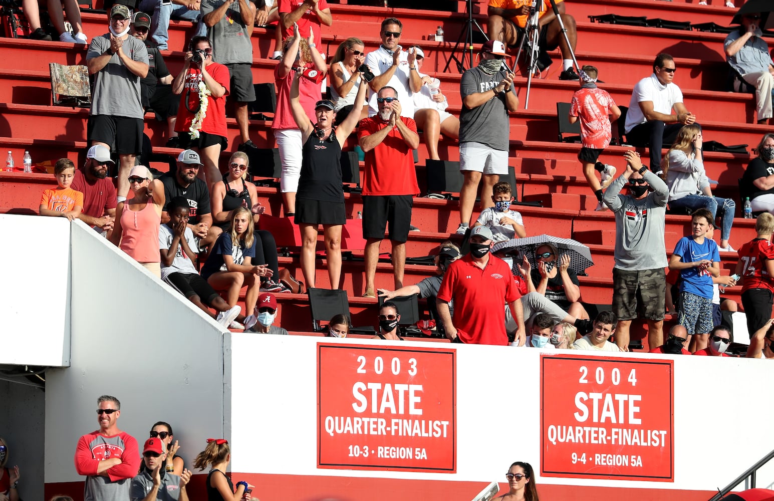 Cherokee fans react after a touchdown in the first half against Carver-Atlanta at Cherokee high school Wednesday, September 2, 2020 in Canton, Ga.. JASON GETZ FOR THE ATLANTA JOURNAL-CONSTITUTION