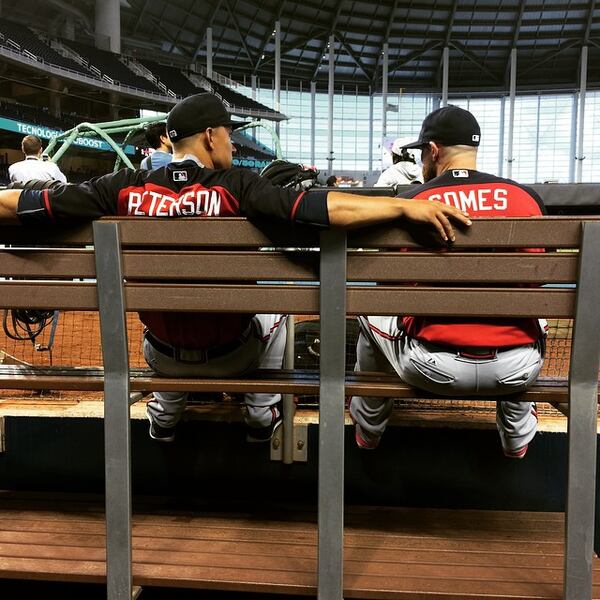 Jace Peterson with veteran Jonny Gomes before Wednesday's game at Miami. Gomes said the rookie asks the right questions. (Photo by David O'Brien)