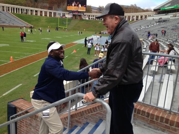 Two Georgia Tech greats exchange pregame greetings - Joe Hamilton and Bobby Ross. (AJC photo by Ken Sugiura)