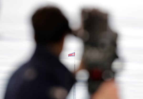 FILE - A North Korean flag flutters in the wind atop a 160-meter tower in North Korea's village Gijungdong as seen from the Taesungdong freedom village inside the demilitarized zone in Paju, South Korea on April 24, 2018. (AP Photo/Lee Jin-man, File)