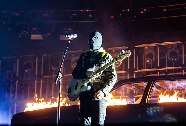 Tyler Joseph greets the State Farm Arena crowd from behind his trademark ski mask.  Photo: Ryan Fleisher/Special to the AJC