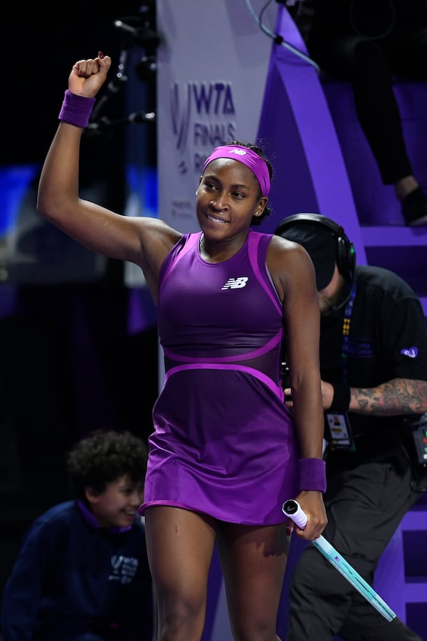 Coco Gauff of the U.S. reacts after winning against China's Qinwen Zheng in their women's singles final match of the WTA finals at the King Saud University Indoor Arena, in Riyadh, Saudi Arabia, Saturday, Nov. 9, 2024. (AP Photo)