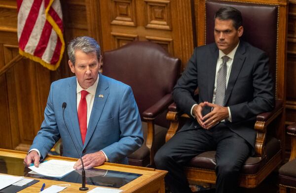 06/26/2020 - Atlanta, Georgia - Lt. Gov. Geoff Duncan, right, watches as Gov. Brian Kemp makes remarks to members of the Georgia Senate in the Senate Chambers on Sine Die, day 40, of the legislative session in Atlanta, Friday, June 26, 2020. (ALYSSA POINTER / ALYSSA.POINTER@AJC.COM)