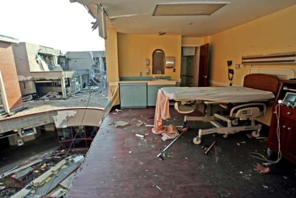 The labor room in the obstetrics ward at Sumter County Regional Hospital was destroyed after a tornado in 2007. At left, the hospital's outdoor courtyard and roof, and the sky, are visible. (AJC FILE PHOTO.)