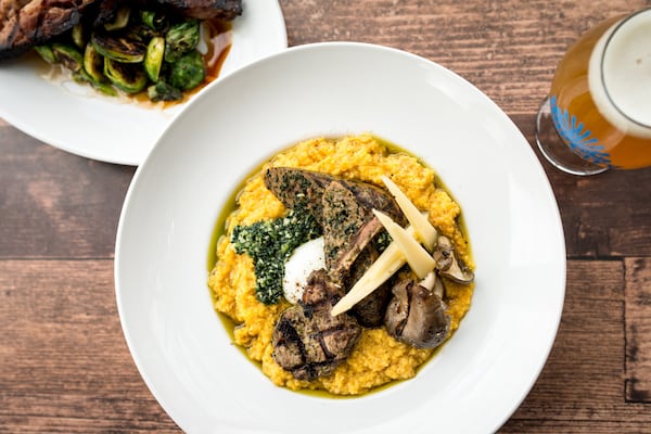 Lamb and Pumpkin Polenta with lamb and kale sausage, lamb chop, kale-almond pesto, poached egg, oyster mushroom, "Thomasville Tomme" and rosemary. Photo credit- Mia Yakel.