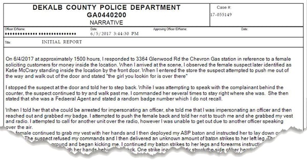 Detail of the narrative portion of the police report filed in the convenience store altercation. DeKalb police redacted the officer's name before they released the report to the public. He was later identified as Officer P.J. Larscheid.