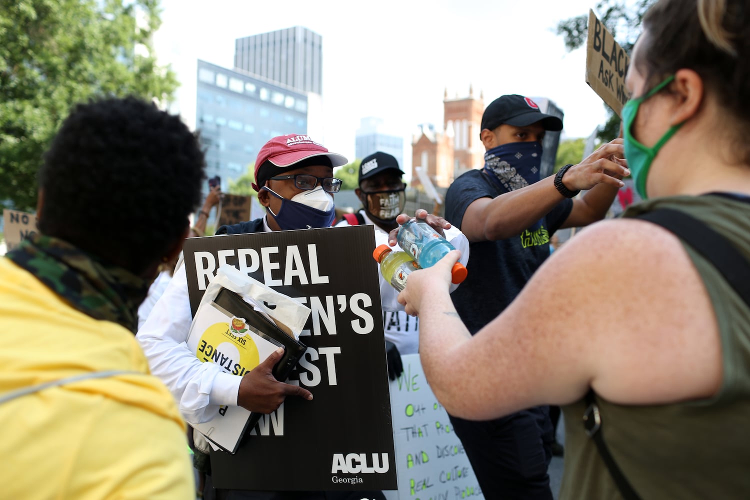 PHOTOS: Thousands march at Georgia Capitol as lawmakers return