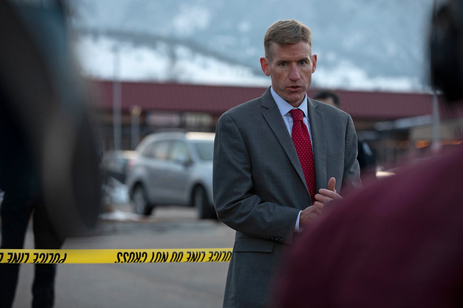 Boulder District Attorney Michael Dougherty speaks during a press conference outside of the Boulder King Soopers grocery store after a shooting that killed multiple people in Boulder, Colo., on Monday, March 22, 2021. (Eliza Earle/The New York Times)