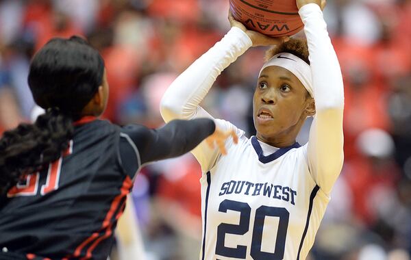 Southwest DeKalb guard Daisa Alexander helped lead the Panthers to the Class AAAAA girls championship. (Kent D. Johnson/AJC)