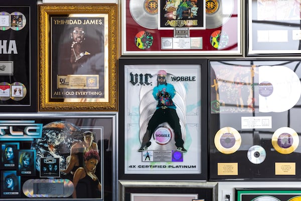 Ceremonial records from music producer Dallas Austin’s collection are on display during a soft launch of a hip-hop pop-up experience at Underground Atlanta on Friday, September 1, 2023. Hip-hop celebrates its 50th anniversary this year. (Arvin Temkar / arvin.temkar@ajc.com)