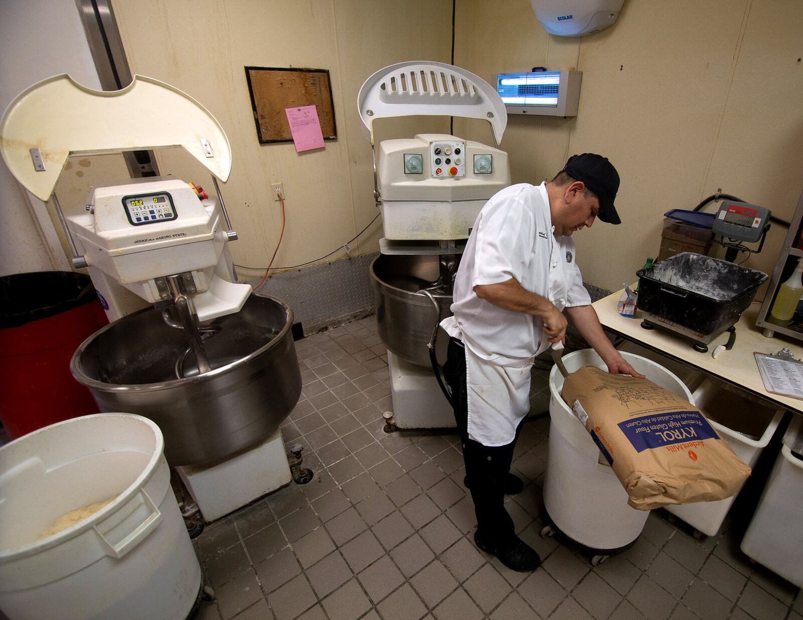 Head baker Cristobal Miranda makes Country Italian bread at the Buckhead Bread Company in Atlanta, July 6, 2020 .STEVE SCHAEFER FOR THE ATLANTA JOURNAL-CONSTITUTION