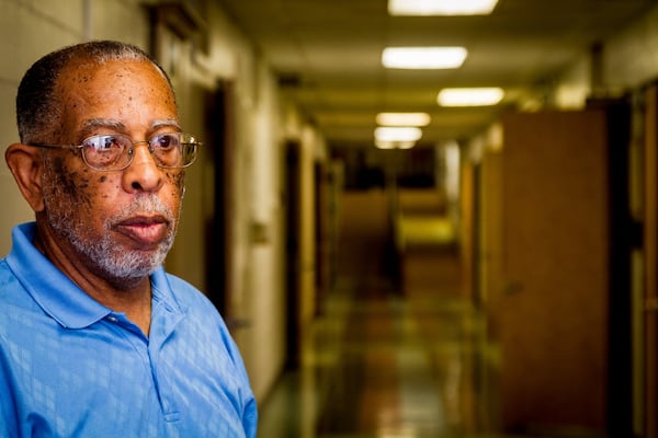 Charles Grogan visits what was the Bailey-Johnson School. The school building is now a Fulton County Schools maintenance building. Grogan said he wishes schools integrated far sooner following the 1954 Brown v. Board of Education decision which outlawed segregation in public schools. WILLIAM THWEATT/William.Thweatt@ajc.com