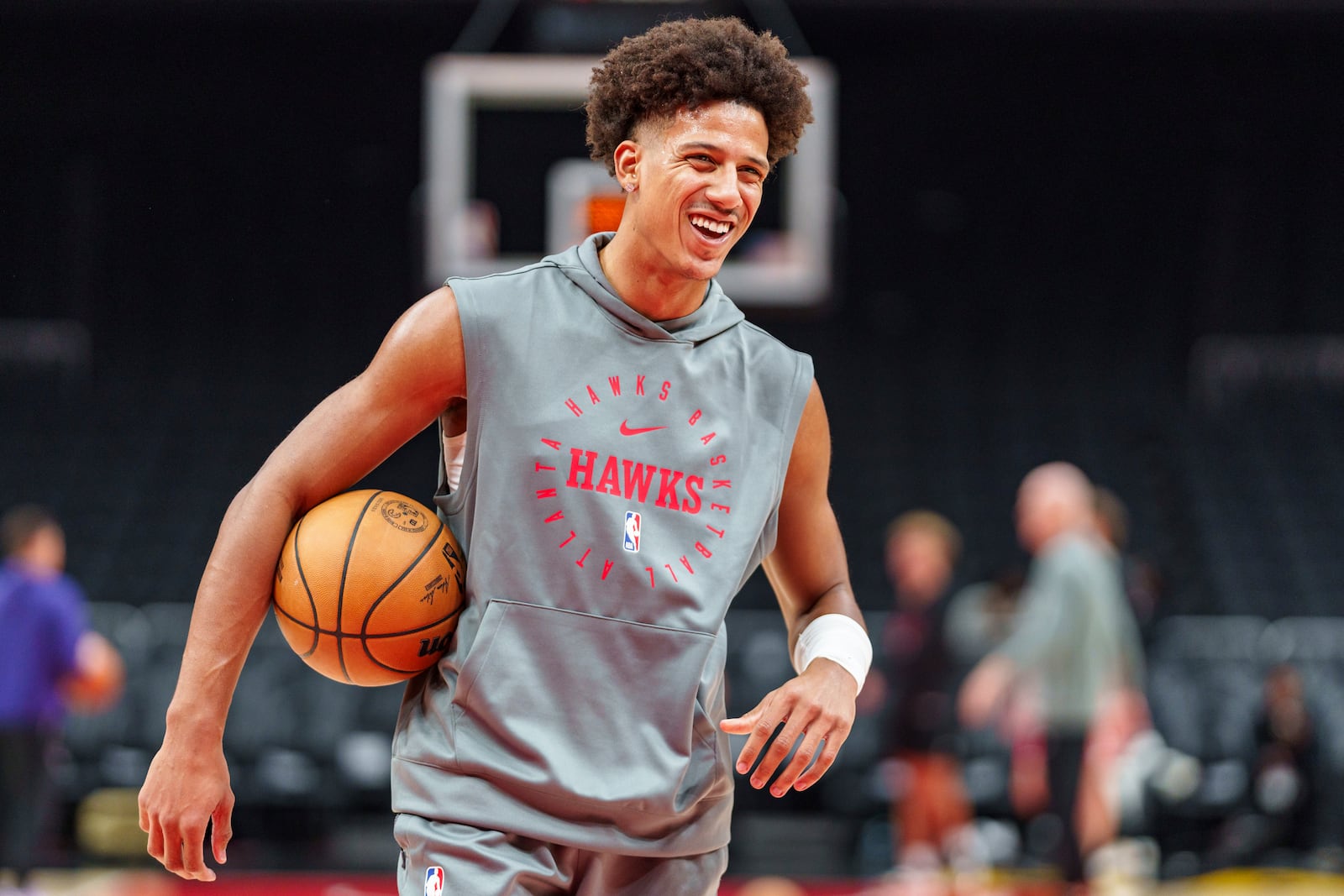 Atlanta Hawks forward Jalen Johnson warms up before an NBA basketball game against the Charlotte Hornets, Friday, Oct. 25, 2024, in Atlanta. (AP Photo/Jason Allen)