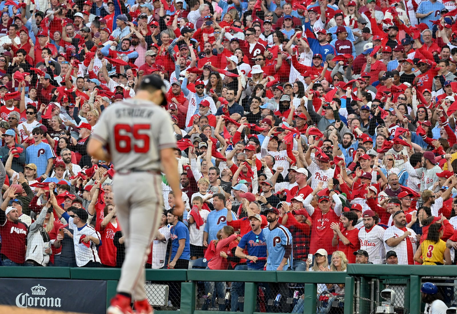 Phillies fans cheer as Braves starter Spencer Strider exits the game with one out in the bottom of the third inning Friday in Game 3 of the National League Division Series at Citizens Bank Park in Philadelphia on Friday, October 14, 2022. (Hyosub Shin / Hyosub.Shin@ajc.com)