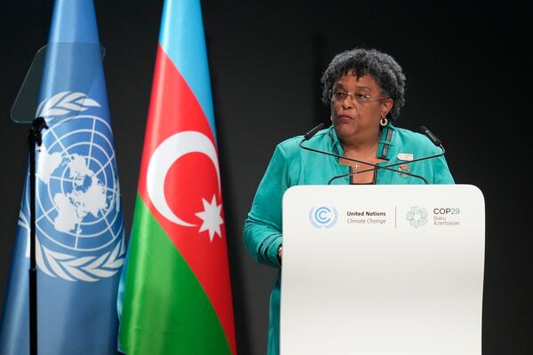 Barbados Prime Minister Mia Mottley speaks during a plenary session at the COP29 U.N. Climate Summit, Tuesday, Nov. 12, 2024, in Baku, Azerbaijan. (AP Photo/Rafiq Maqbool)