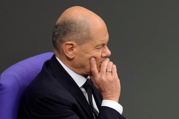 German Chancellor Olaf Scholz attends a plenary session in the German parliament Bundestag in Berlin, Germany, Wednesday, Nov. 13, 2024. (AP Photo/Markus Schreiber)