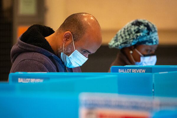 A voter makes ballot selections at Landmark Church in Peachtree Corners, Georgia, on Tuesday, Nov. 3, 2020. (Casey Sykes/The Atlanta-Journal Constitution/TNS)