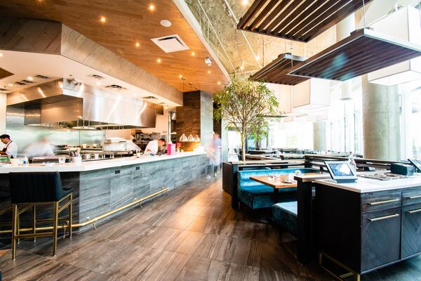 The light-filled, modern dining room of Mission and Market is nestled into the ground floor of the new Three Alliance Center tower in Buckhead. CONTRIBUTED BY HENRI HOLLIS