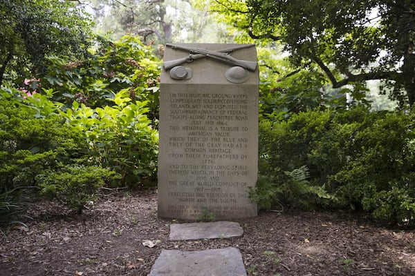 JULY 12, 2018 — The Granite Confederate Marker sits in a grassy knoll in front of E. Rivers Elementary School in Atlanta. (ALYSSA POINTER/ALYSSA.POINTER@AJC.COM)