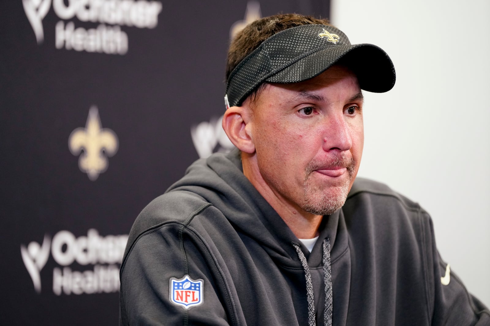 New Orleans Saints head coach Dennis Allen speaks during a news conference after loss against the Carolina Panthers in an NFL football game Sunday, Nov. 3, 2024, in Charlotte, N.C. (AP Photo/Rusty Jones)