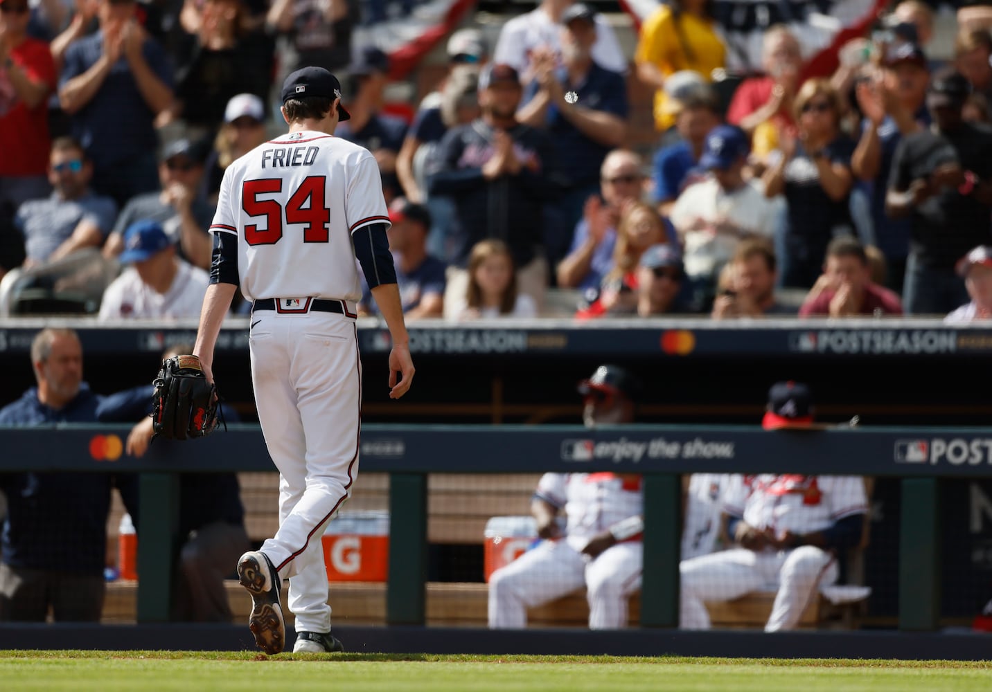 Atlanta Braves' Brian Snitker removes Max Fried during the fourth inning of game one of the baseball playoff series between the Braves and the Phillies at Truist Park in Atlanta on Tuesday, October 11, 2022. (Jason Getz / Jason.Getz@ajc.com)