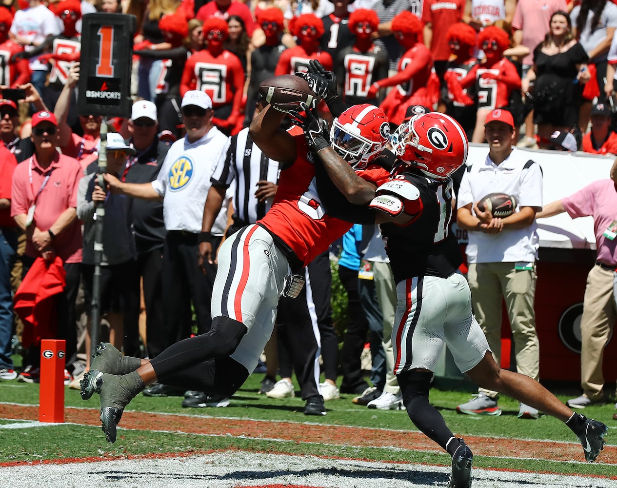 Georgia wide receiver Colbie Young catches a touchdown pass over defensive back Julian Humphrey for a 10-7 lead during the second quarter of the G-Day game on Saturday, April 13, 2024.  Curtis Compton for the Atlanta Journal Constitution