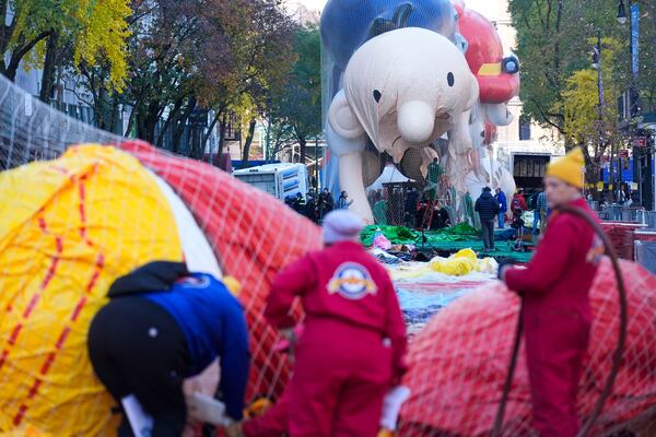 Floats, including a character from "Diary of a Wimpy Kid", are inflated in preparation for the Macy's Thanksgiving Day Parade in New York, Wednesday, Nov. 27, 2024. (AP Photo/Seth Wenig)