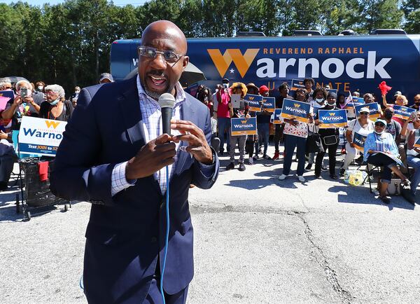 092622 Atlanta: Senator Reverend Raphael Warnock speaks to supporters while making a campaign stop at Cascade Family Skating on Monday, Sept. 26, 2022, in Atlanta.   “Curtis Compton / Curtis Compton@ajc.com