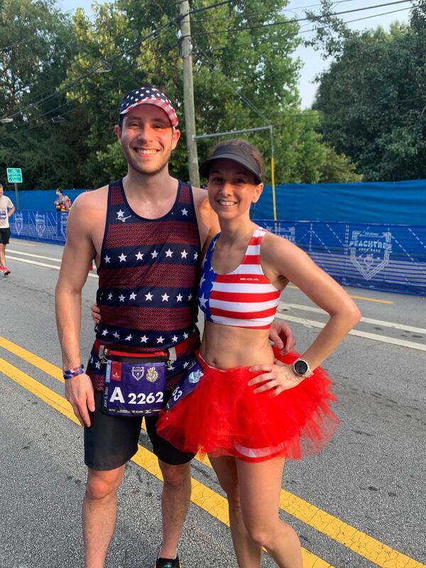 Brad and Heather Sobel of Smyrna ran together on Saturday, July 3, 2021. (Photo: Caroline Silva/AJC)