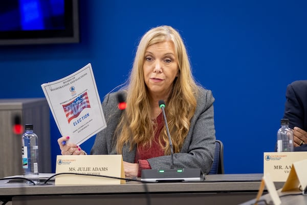 Julie Adams, a Republican member of the Fulton County election board, lost a lawsuit last month when a judge ruled that election board members had a duty to certify results. Adams, who had argued that she could vote against certifying, voted Tuesday to certify the Nov. 5 election. “It’s funny — I don’t know who won a lot of these races,” said Adams, who wanted more details to compare voter check-ins with results. “I have no idea what I just voted ‘yes’ to, but I have a court order that I have to.” (Arvin Temkar / AJC)