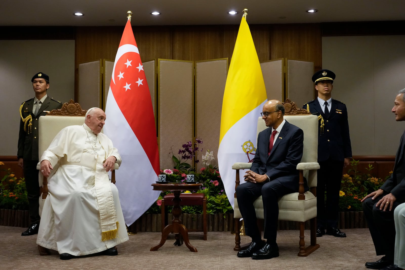 Pope Francis meets with the President of the Singapore Republic Tharman Shanmugaratnam, right, at the Parliament House in Singapore, Thursday, Sept. 12, 2024. Pope Francis flew to Singapore on Wednesday for the final leg of his trip through Asia, arriving in one of the world's richest countries from one of its poorest after a record-setting final Mass in East Timor. (AP Photo/Gregorio Borgia, pool)