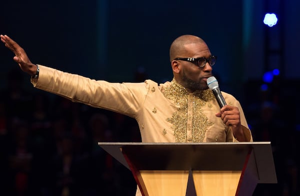 Jamal Bryant delivers his first sermon as the official pastor of New Birth Missionary Baptist Church in Stonecrest. STEVE SCHAEFER / SPECIAL TO THE AJC