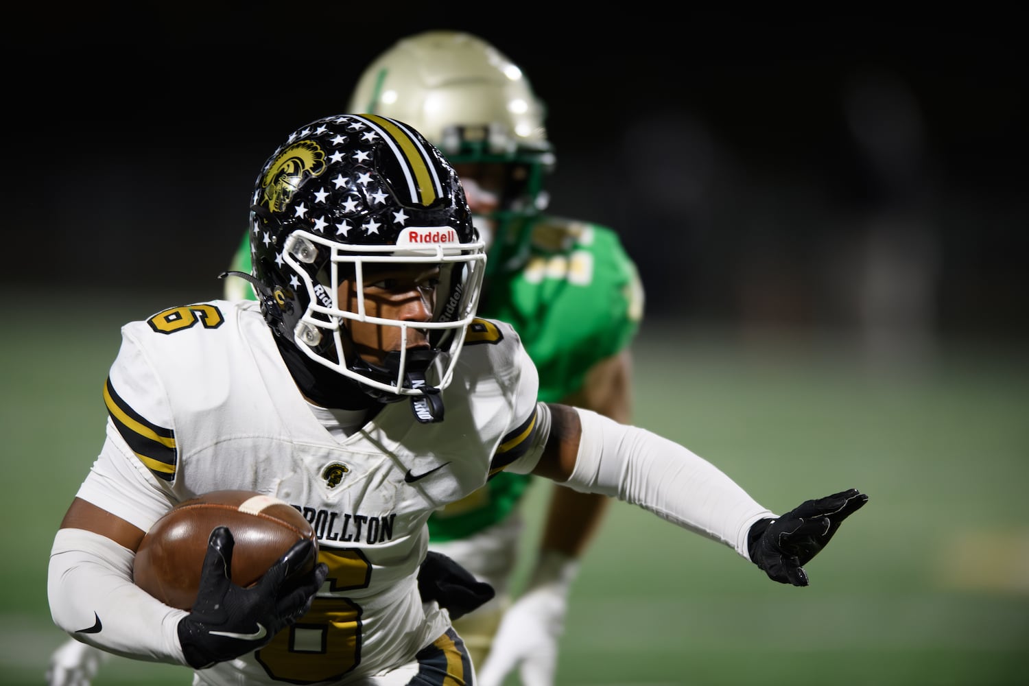 Carrollton’s Peyton Zachary looks for open field. (Jamie Spaar for the Atlanta Journal Constitution)