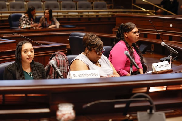 From left to right, Dominique Grant, Tabatha Trammell and Tiana Hall wait to testify during a hearing that is a part of Sen. Jon Ossoff’s ongoing investigation into the abuse of pregnant women in state prisons and jails on Wednesday, Aug. 14, 2024. (Natrice Miller/ AJC) 