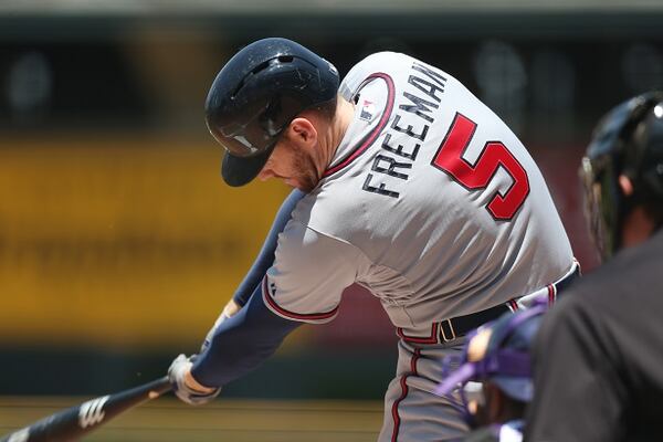 Atlanta Braves' Freddie Freeman grounds out against the Colorado Rockies in the first inning of a baseball game in Denver on Thursday, June 12, 2014. (AP Photo/David Zalubowski) He's not apt to go anywhere, folks. (David Zalubowski/AP)