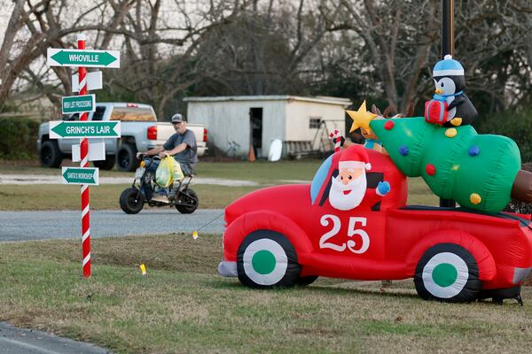 Some residents in the city of Santa Claus, Ga., have noticed fewer neighbors putting up lights and holiday decorations in recent years. Some older residents have scaled back, but others still dress up their yards.
 Miguel Martinez / miguel.martinezjimenez@ajc.com