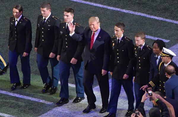 January 8, 2018 Atlanta - President Donald Trump attends during College Football Playoff National Championship at Mercedes-Benz Stadium on Monday, January 8, 2018. HYOSUB SHIN / HSHIN@AJC.COM