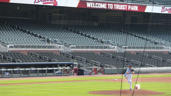 Braves pitcher Cole Hamels throws from the mound during the first workout of summer Friday, July 3, 2020, at Truist Park in Atlanta.