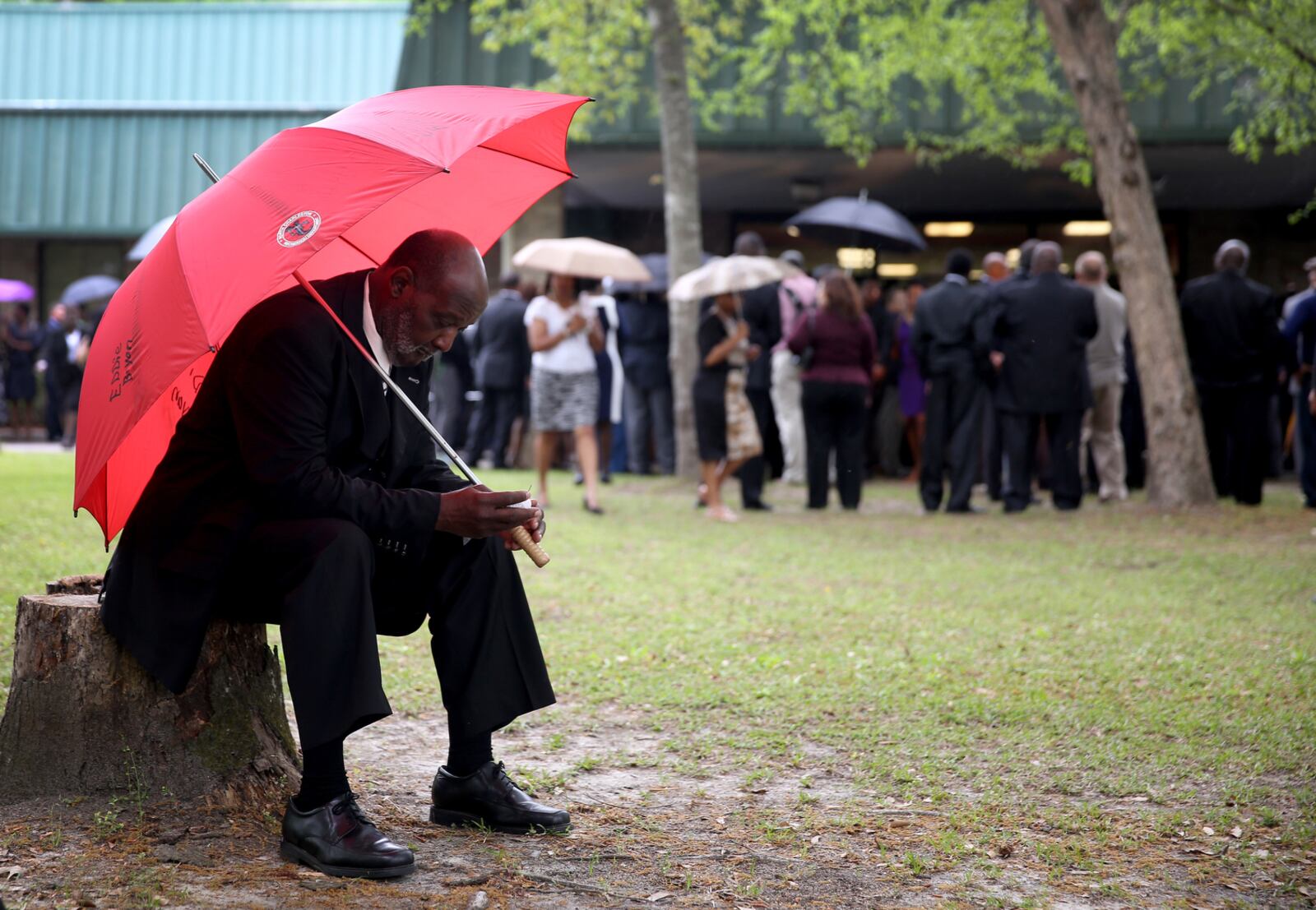 Eddie Bryan waits to enter the W.O.R.D. Ministries Christian Center for the funeral of Walter Scott, after he was fatally shot by a North Charleston police officer after fleeing a traffic stop in North Charleston. (File photo by Joe Raedle)